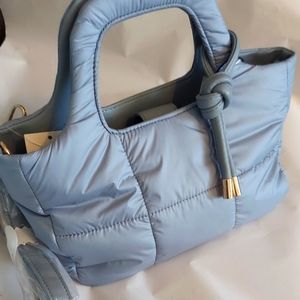 NWT Urban Expressions quilted cross body in robin egg blue.